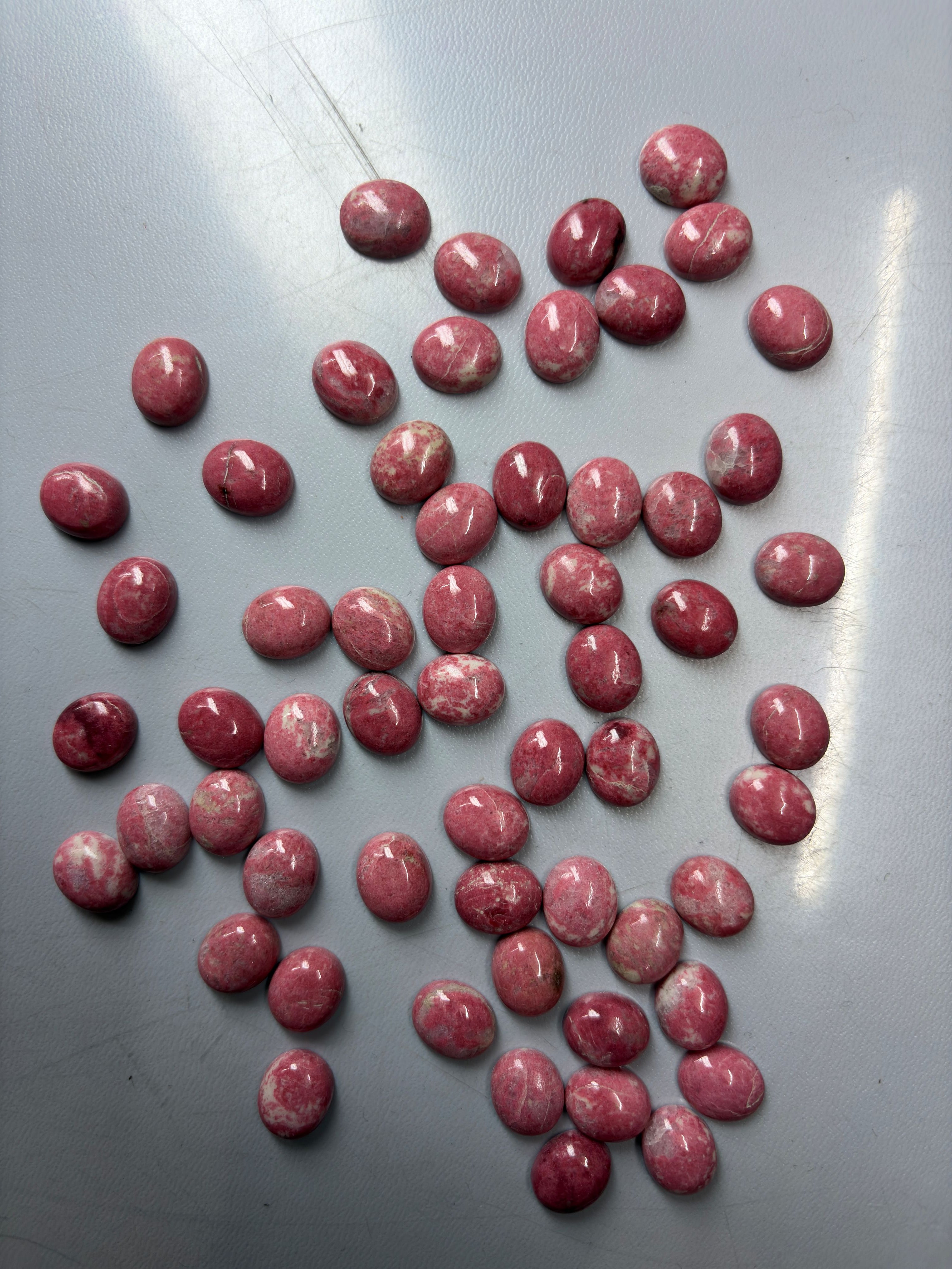 Pink Thulite jasper shapes