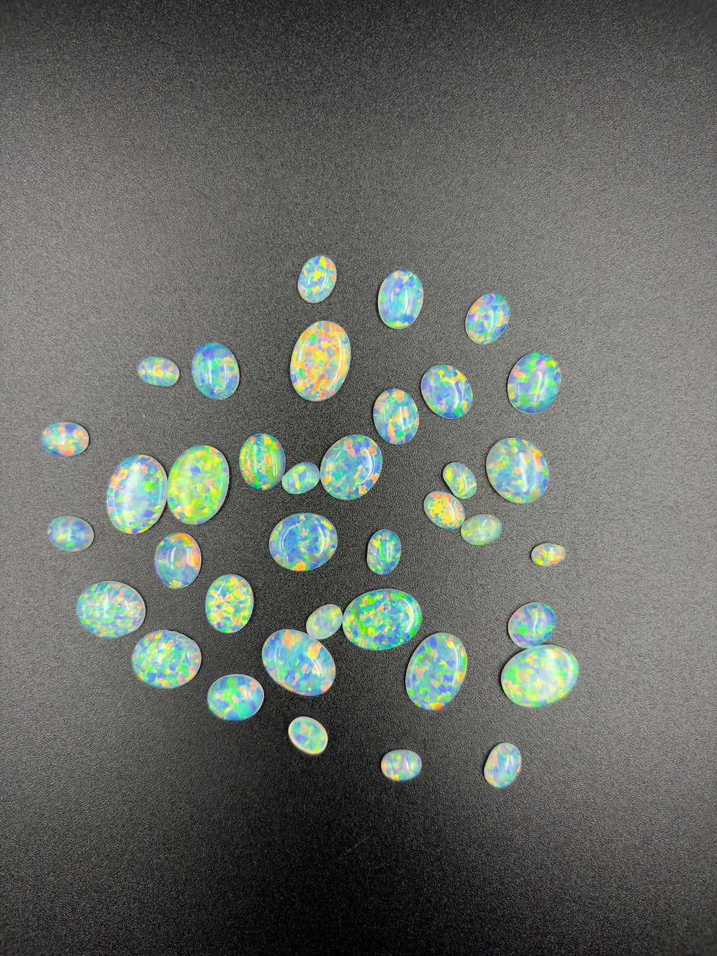 White Lab Created Synthetic Sparkling Opal Oval Shaped Cabochon Various Sizes