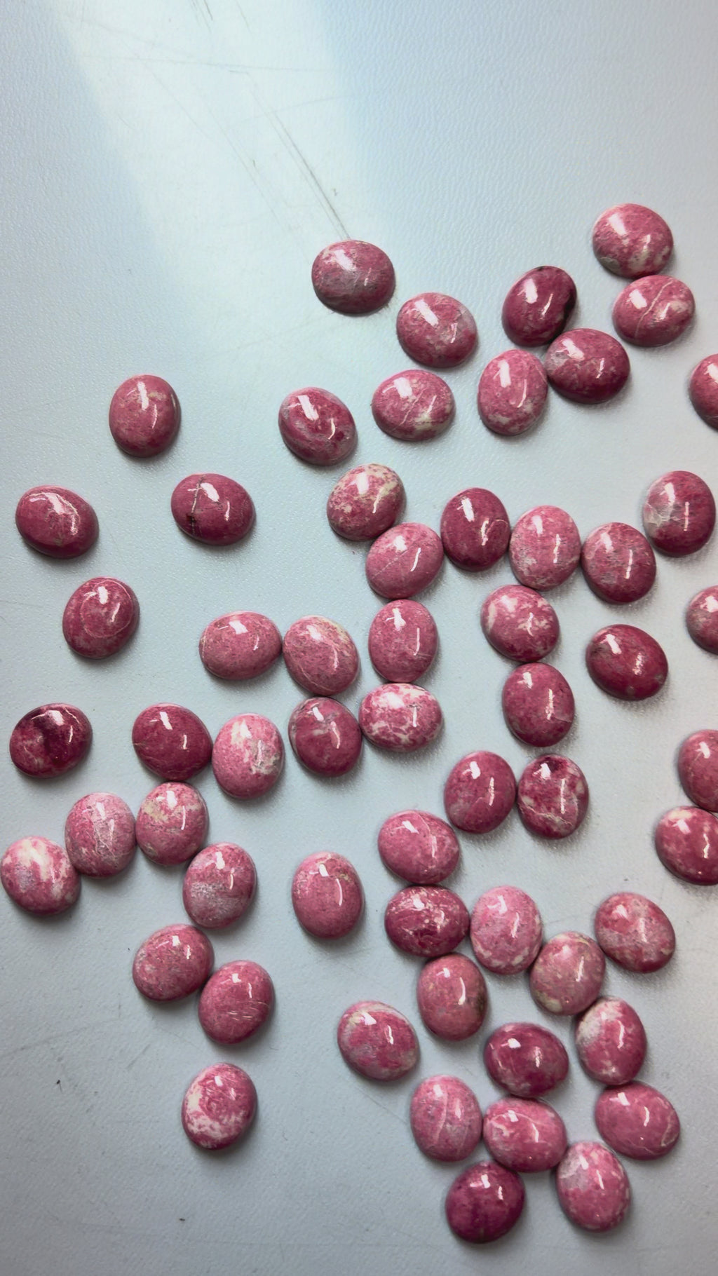Pink Thulite jasper shapes
