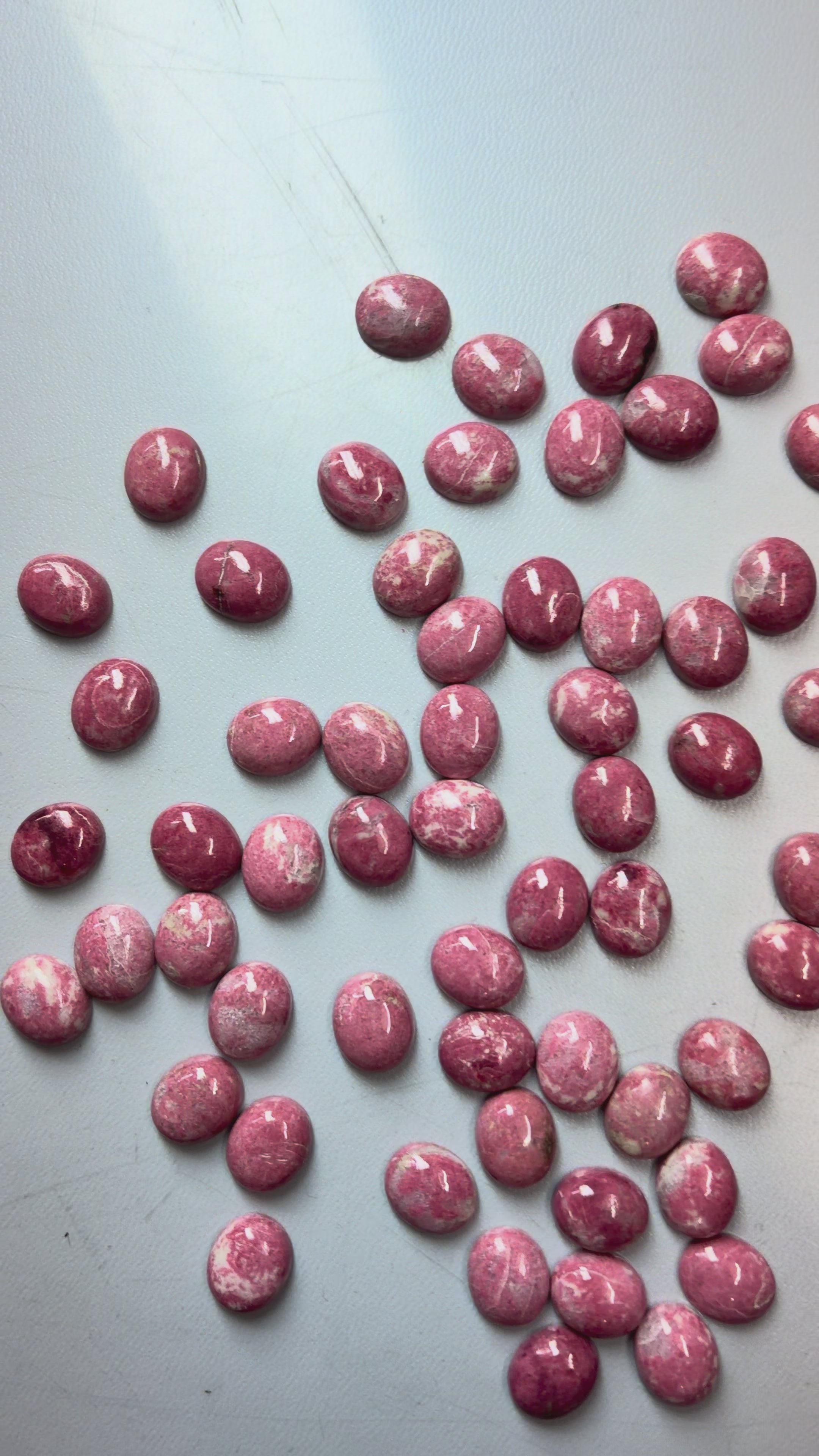 Pink Thulite jasper shapes